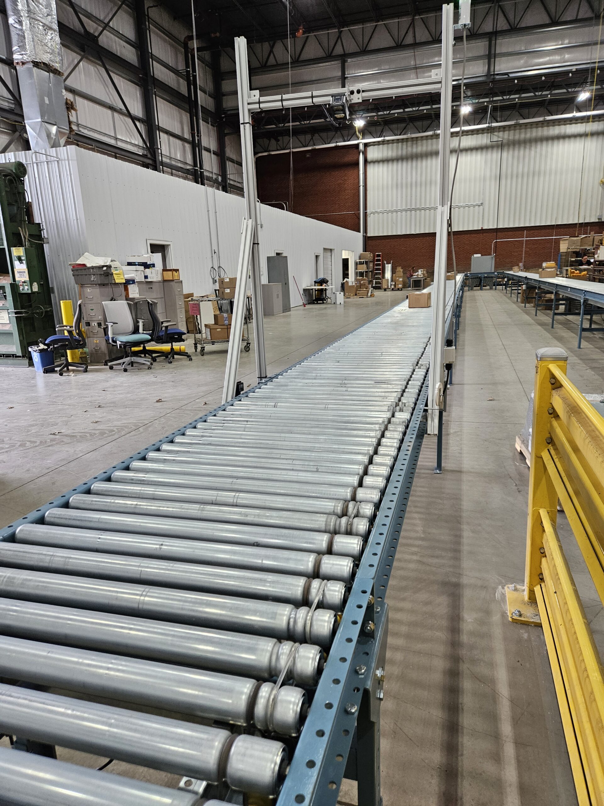 Line Shaft Conveyor System with Scanner to read product and engage diverter gate accordingly